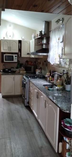 OPORTUNIDAD VENDO CHALET CON PILETA  CON CALDERA Y DEPARTAMENTO EN BARRIO LA CUESTA