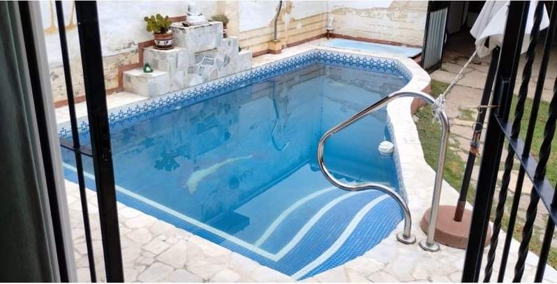 OPORTUNIDAD VENDO CHALET CON PILETA  CON CALDERA Y DEPARTAMENTO EN BARRIO LA CUESTA