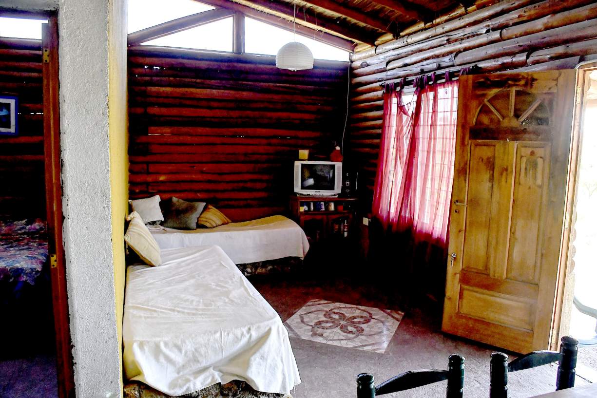 VENDO: TERRENO CON DOS CABAÑAS EN ESPEJO - CABALANGO
