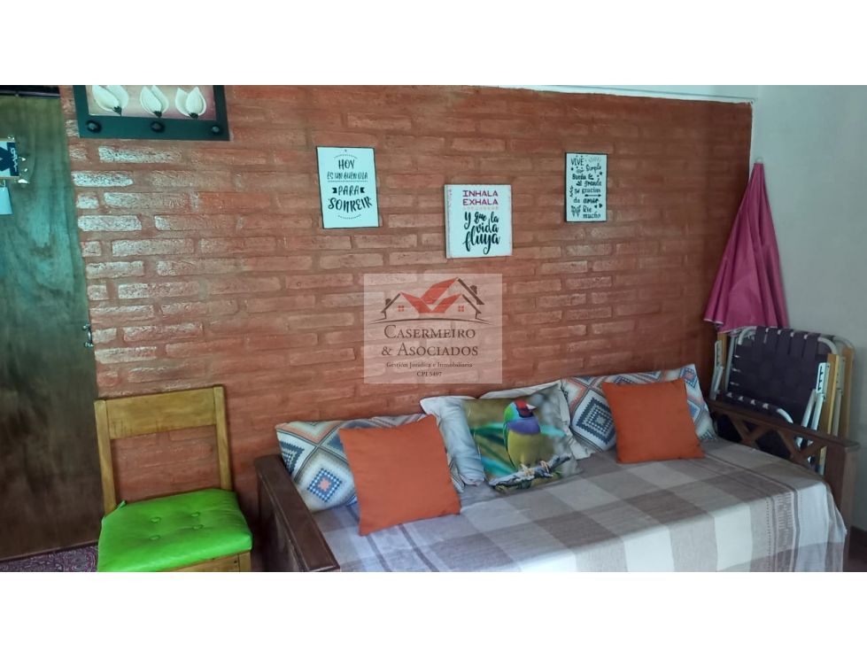 LOTE CON DOS CASAS EN ANISACATE.