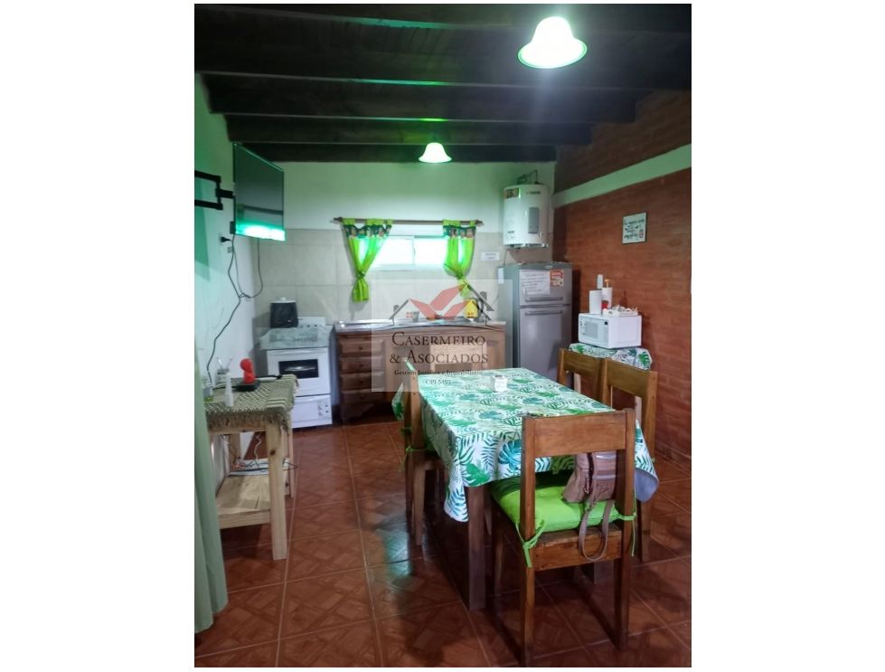 LOTE CON DOS CASAS EN ANISACATE.