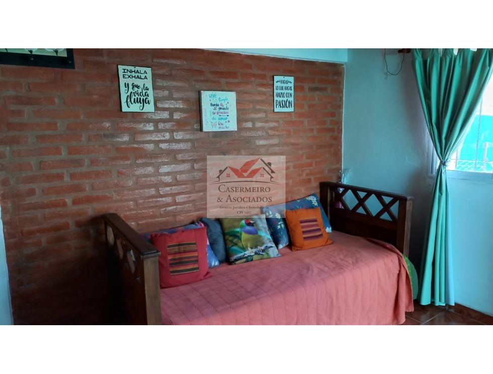 LOTE CON DOS CASAS EN ANISACATE.