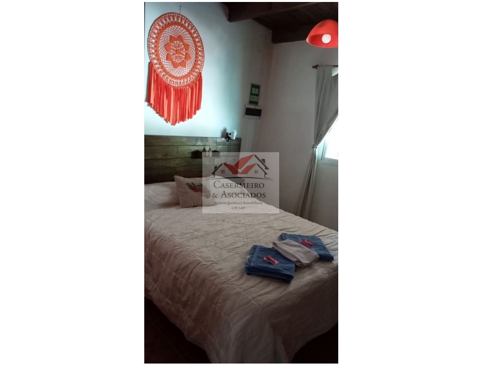 LOTE CON DOS CASAS EN ANISACATE.