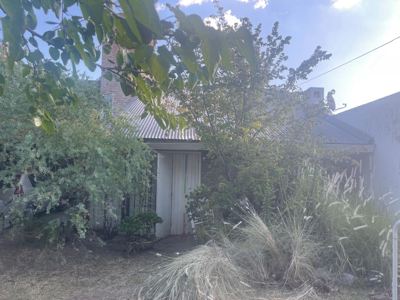 VENDO CASA  3 DORMITORIOS EN EL CERRO DE LAS ROSA