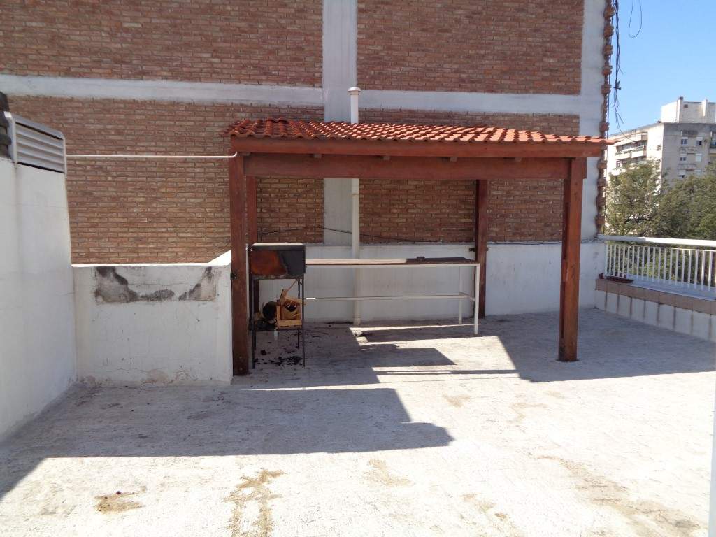 Centro - Departamento de Categoría de 1 Dormitorio Amplio con Balcón, Cocina Separada y Terraza Ampl