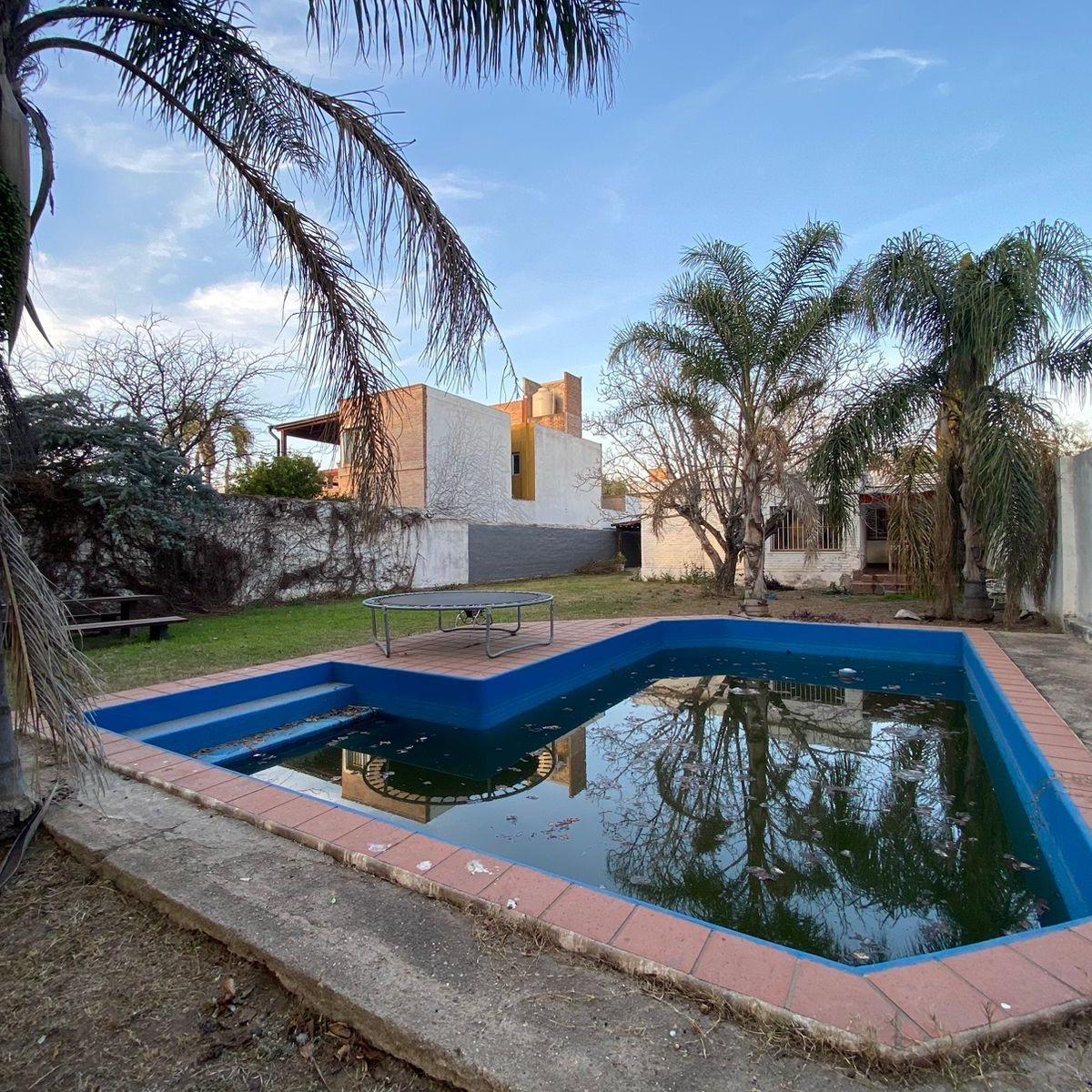 Oportunidad Única en Villa Belgrano: Casa Apta Crédito con Gran Patio y Quincho