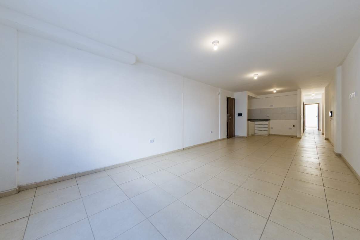 VENTA. DEPARTAMENTO A ESTRENAR. 2 DORM. PATIO CON PASTO. ALBERDI. CÓRDOBA