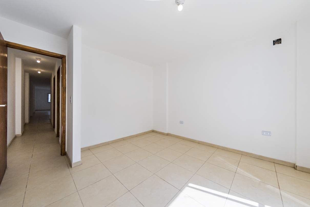 VENTA. DEPARTAMENTO A ESTRENAR. 2 DORM. PATIO CON PASTO. ALBERDI. CÓRDOBA