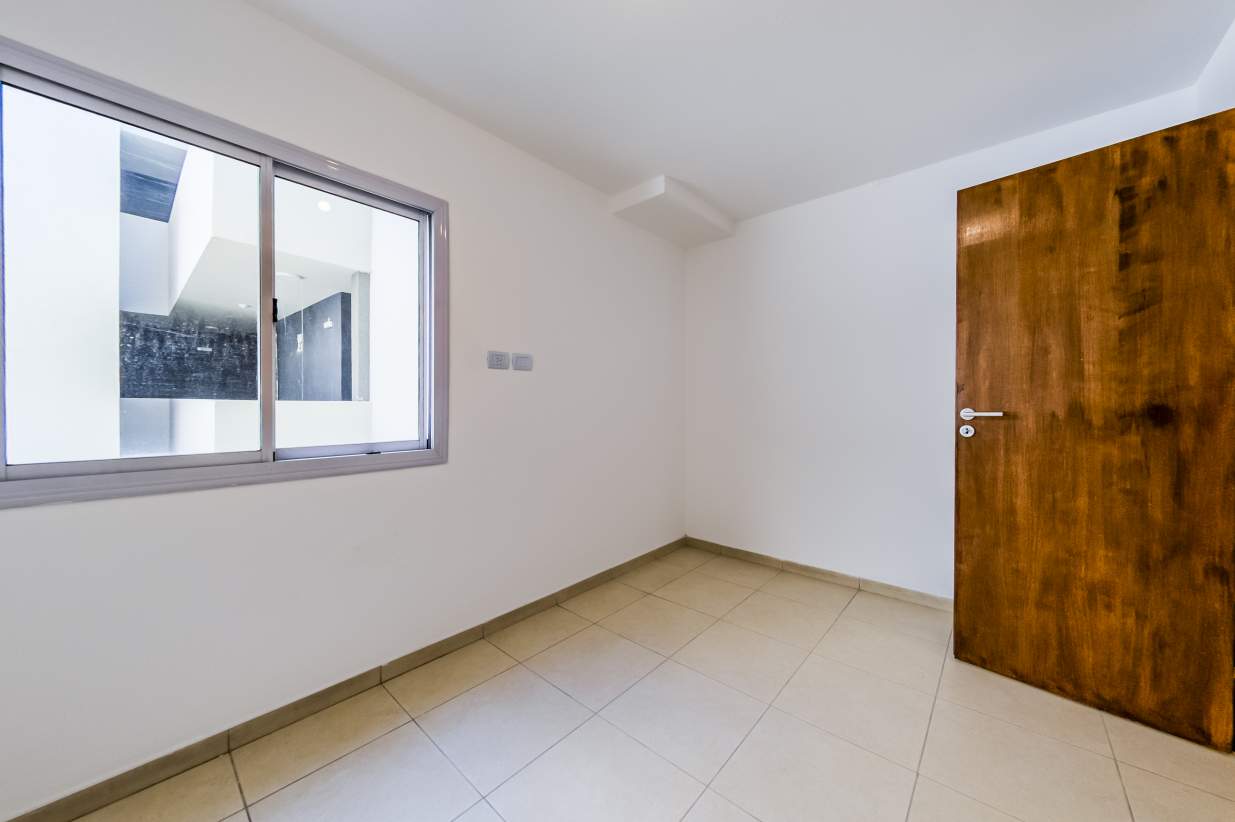 VENTA. DEPARTAMENTO A ESTRENAR. 2 DORMITORIOS. BALCÓN CON ASADOR. ALBERDI. CÓRDOBA.
