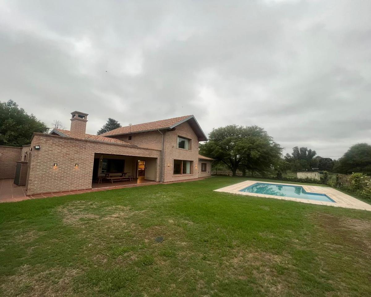 ALQUILER TEMPORARIO CASA 3 DORMITORIOS EN VILLA LAGO AZUL  CARLOS PAZ TANTI