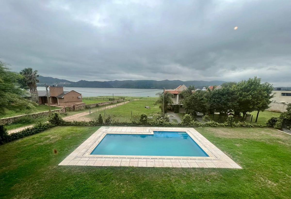 ALQUILER TEMPORARIO CASA 3 DORMITORIOS EN VILLA LAGO AZUL  CARLOS PAZ TANTI