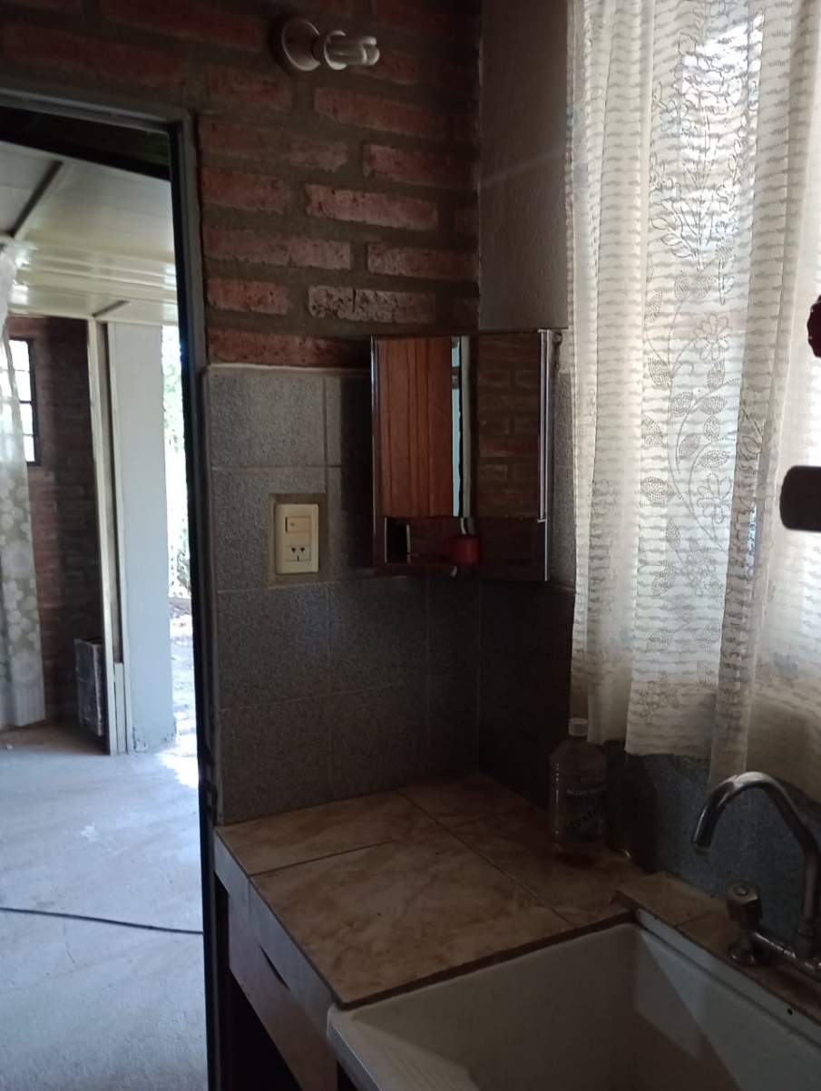 Casa de campo de dos dormitorios en alquiler, quincho , asador y garage
