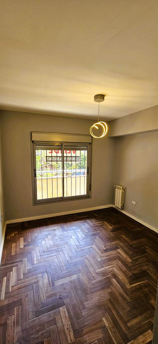 OPORTUNIDAD General Paz departamento en venta de dos dormitorios, dos baños, balcón y calefacción central