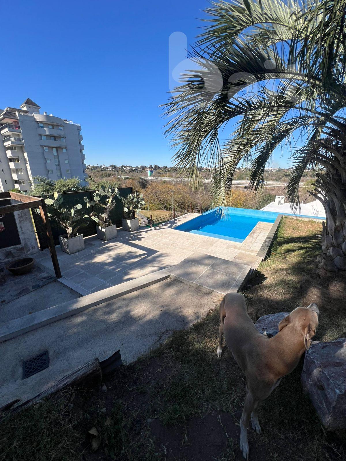 Venta casa en housing con seguridad de 4 dormitorios en Villa Belgrano