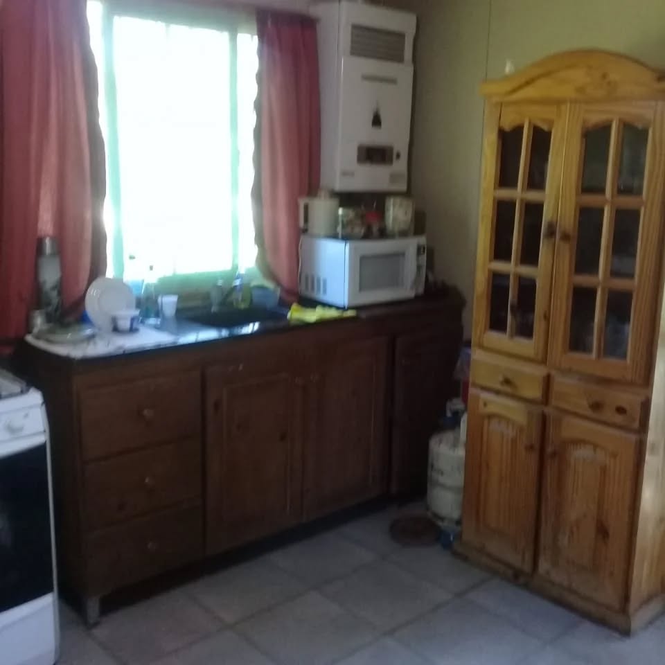 VENTA CASA PREMOLDEADA- TERRENO 1200 M2-CHARBONIER-CORDOBA
