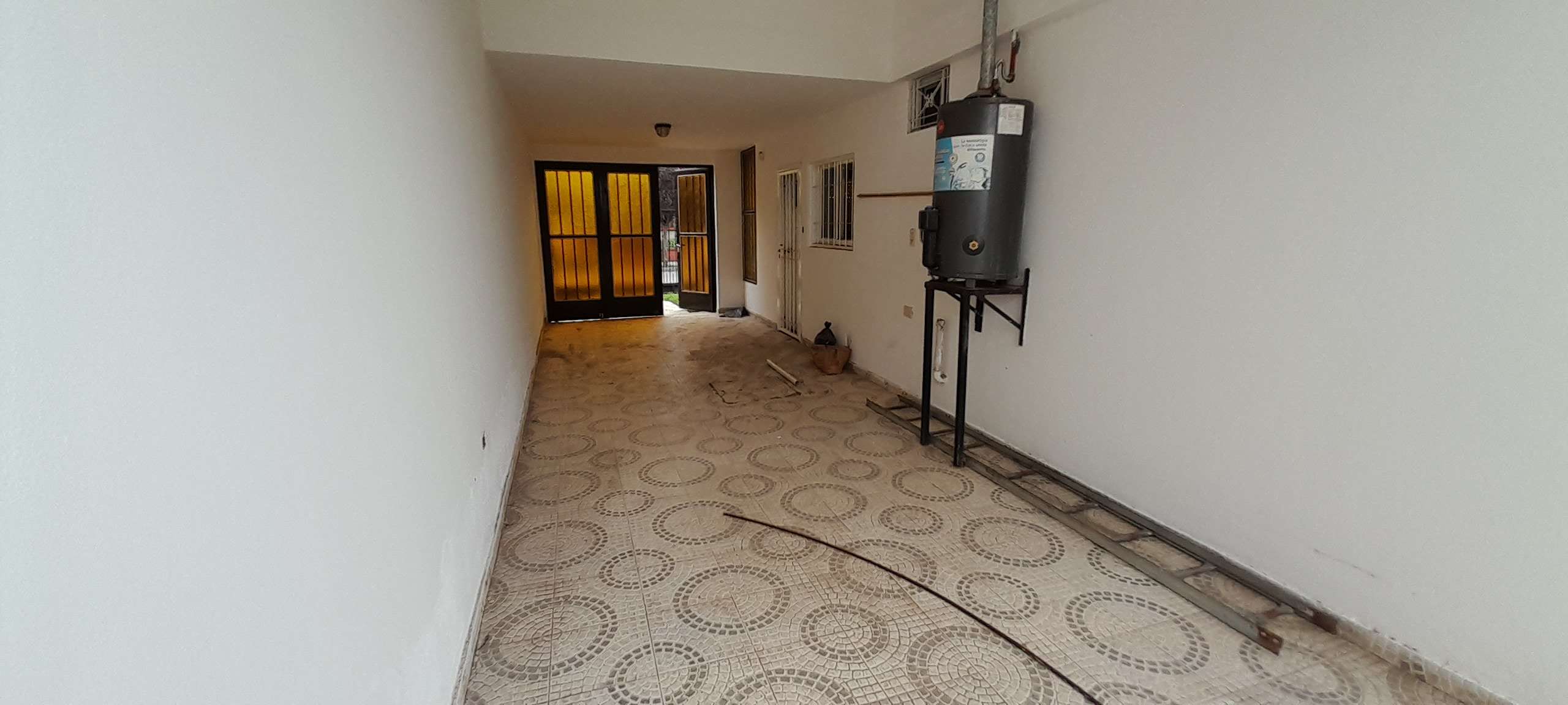 SANTA CLARA DE ASIS - CORREA DE SAA 2455 - CASA 2 DORMITORIOS CON GARAGE Y PATIO